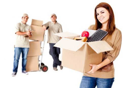 Packers organizing household items for a move in Hackney