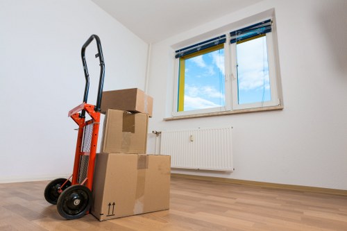 Organised removal team loading boxes for a local house move