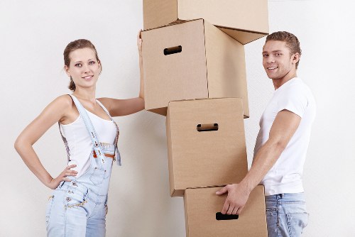 Packed boxes and furniture ready for transport from a Hackney home