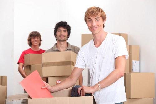 Loading furniture into a van for a local move in Hackney