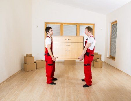 Furniture being moved through a Hackney apartment building